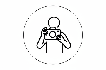 icon of photographer holding camera